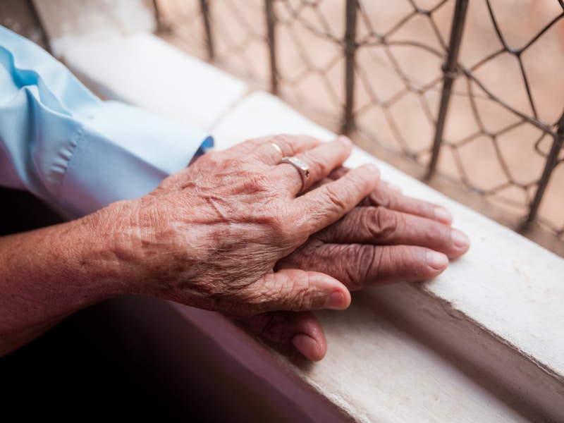 Caregiver spending time with a client at home